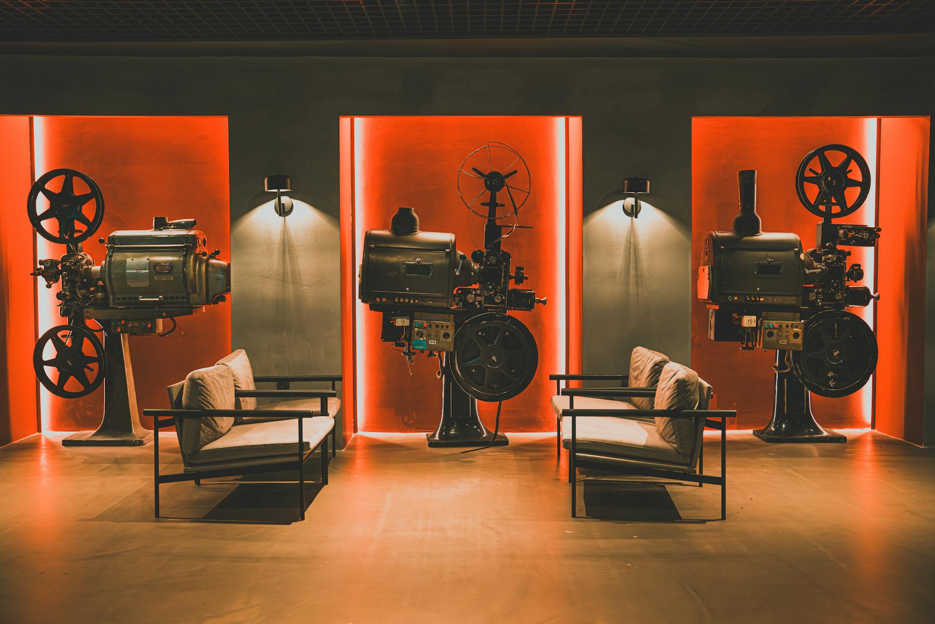 sofas and vintage film projectors in a room