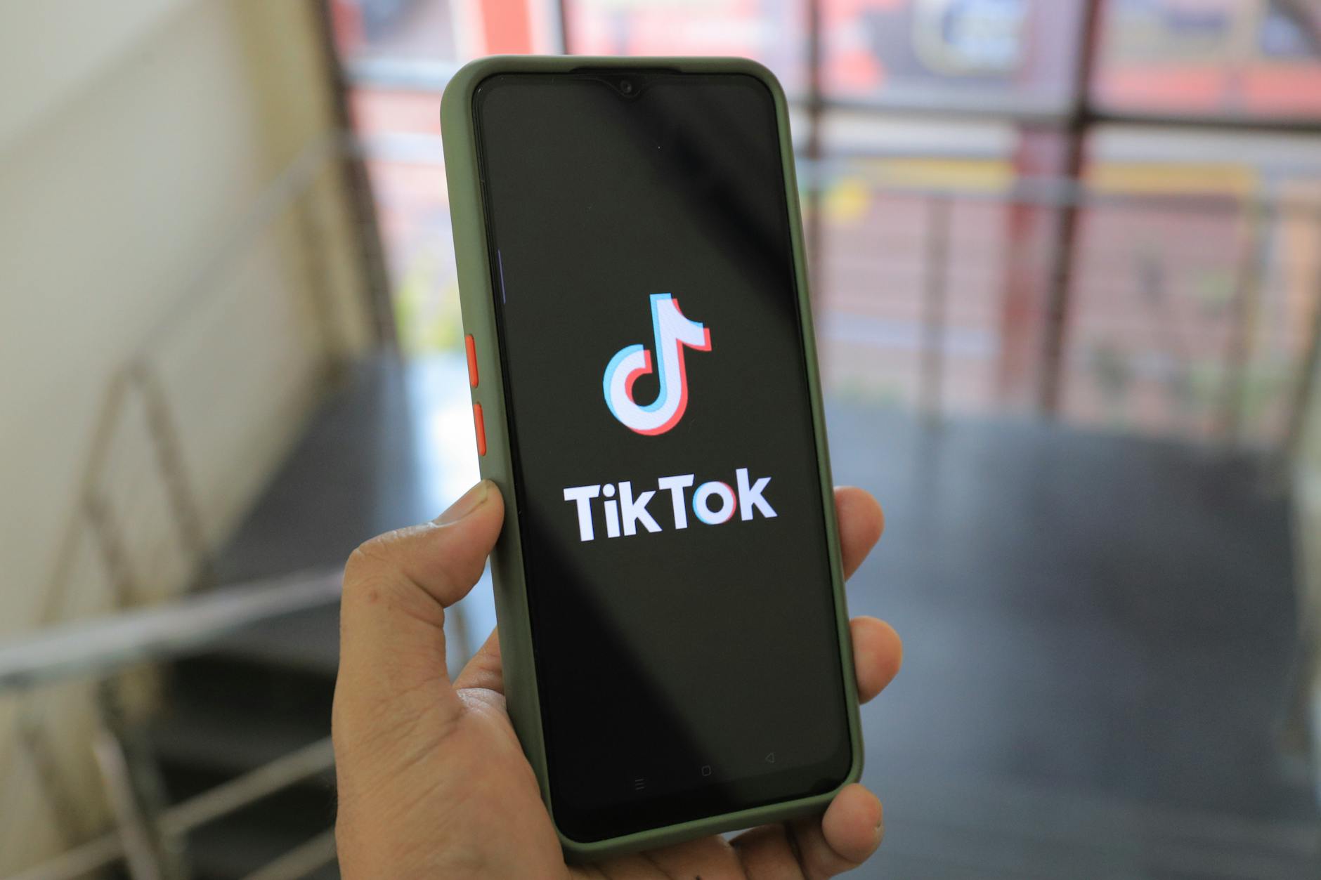 a person holding a cellphone